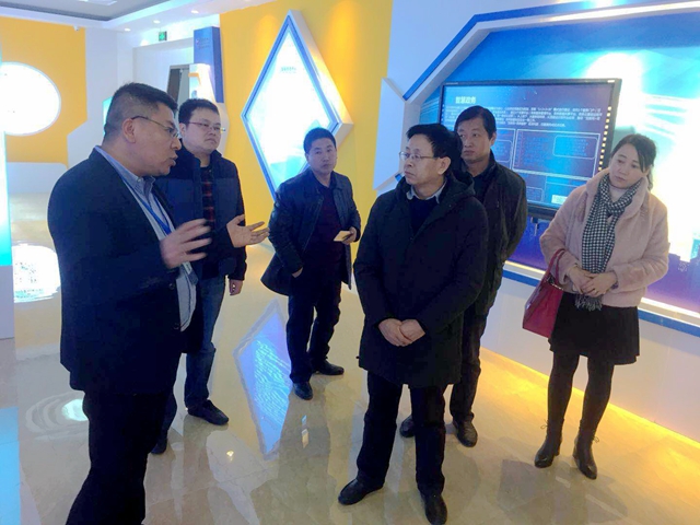民建兰州市委王卫东主委率队参观考察国家信息中心国信安全甘肃中心_副本.jpg